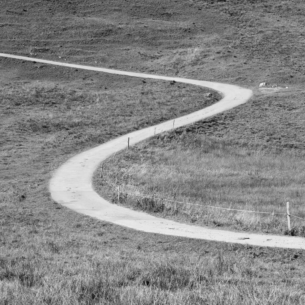 winding road in alpine landscape